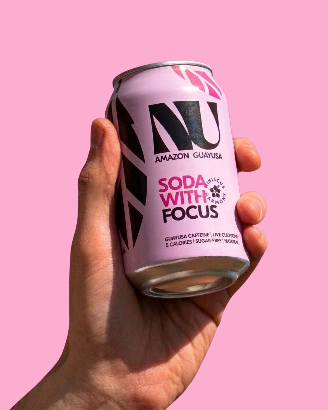 A hand holding the Hibiscus Harmony Flavour by NU